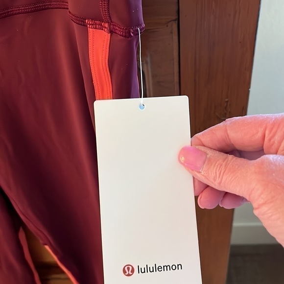 NWT Lululemon Women’s maroon and coral cropped leggings, size 12. - Picture 2 of 7